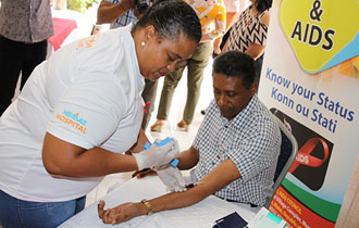 President Faure participates in HIV testing for World Aids Day